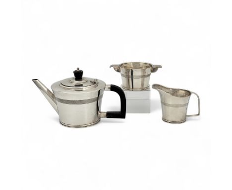 An Art Deco sterling silver tea set, Blanckensee & Sons, 1934, teapot with terraced cover and finial and machine engraved 'ch