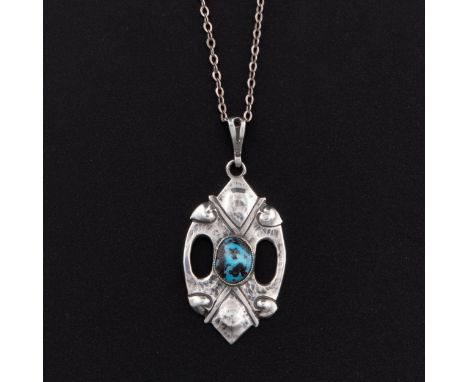An Art Nouveau white metal pendant and chain c. 1910, design attributed to Oliver Baker (1856-1939) for Liberty & Co, pendant