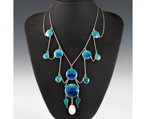 An early 20th century silver and enamel necklace, this festooned necklace is comprised of two chains interconnected with grad
