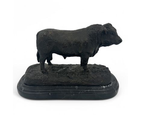 A late 20thC patinated cast bronze sculpture of a bull standing on a figured landscape-like mound, after Jules Moigniez (1835