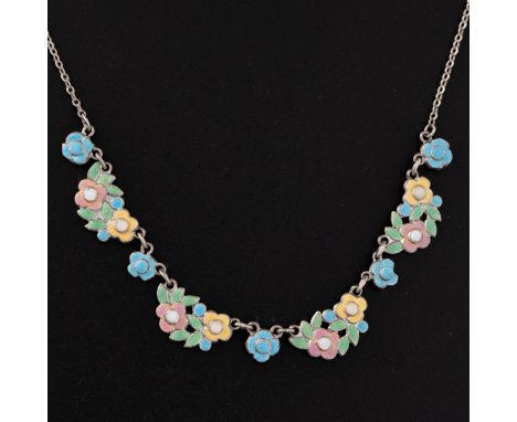 A white metal and enamel necklace attributed to Bernard Instone, c.1930, typical polychrome flowers and leaves mounted on a s