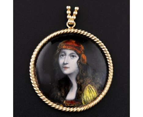 An Early 19thC Limoges yellow metal and enamel pendant c.1800, the enamel on copper depicts a young lady with iridescent scar