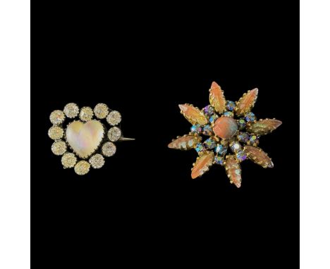 A Czech Saphiret and gilt metal star-shaped brooch or pin, c1900-1910, prong set with eight elongated oval faceted Saphirets 
