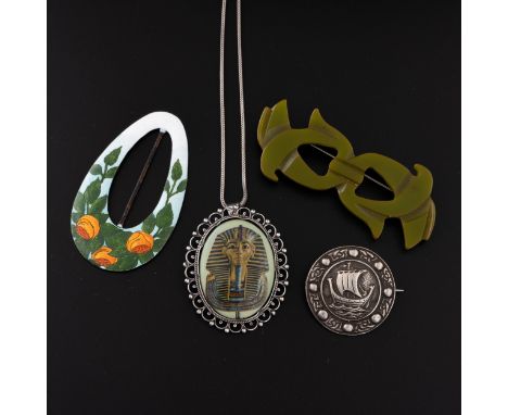 A collection of early 20th century brooches, buckle and pendant, including a white metal (marked 800 silver) and glass pendan