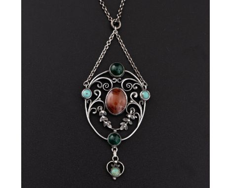 An English Arts and Crafts white metal pendant necklace, c.1910, with openwork white metal frame supporting a carnelian, a pa