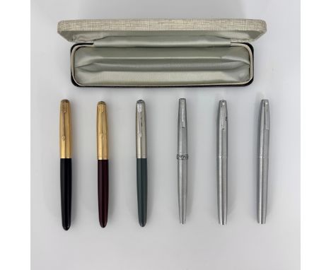 Three Parker 51 Aerometric fountain pens, comprising a black 51 Custom with gold filled cap and medium nib in a Parker box, a