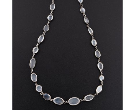 A mid-20thC Continental or American white metal and moonstone necklace, with white metal chain supporting a series of graduat