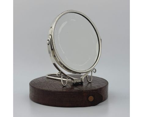 An Edwardian sterling silver gentleman's or lady's vanity mirror and case, made and retailed by Grey & Co of London in 1903, 