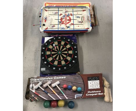 A vintage Hot Shot Canadian Ice Hockey game by J.W. Spear. Together with an electronic darts board (darts missing) and a outd