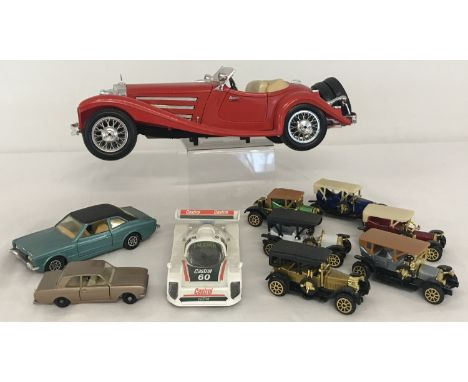 A collection of diecast and plastic cars. To include Burago Mercedes Benz 500 K Roadster 1:18 scale, a Lesney "Matchbox" Ford