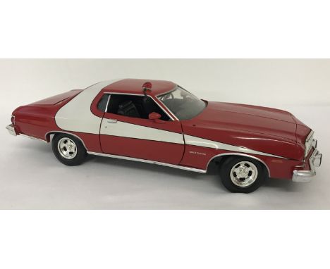 An unboxed 1:18 scale diecast model of Starsky And Hutch 1976 Ford Gran Torino by ERTL.  From a private collection.