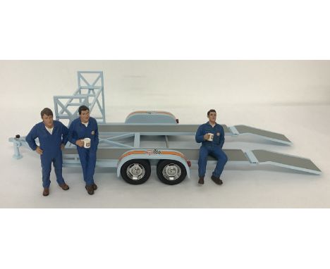 An unboxed 1:18 scale diecast car trailer with ramps and racks with Gulf decals by GMP. Complete with 3 mechanic figures. Fro