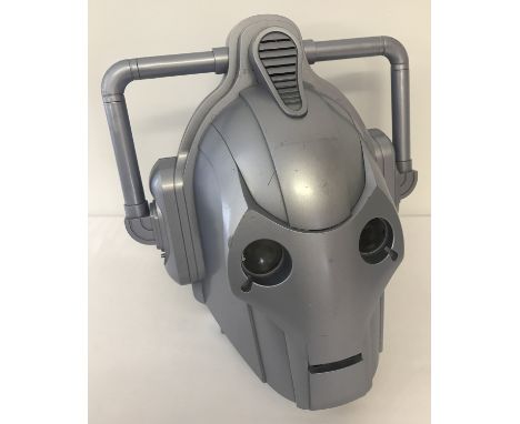 A battery operated voice changing Dr Who Cyberman helmet.  