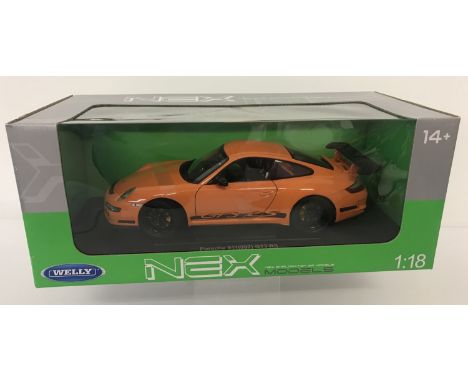 A new boxed 1:18 scale Nex Models Porsche 911(997)GT3 RS by Welly. In orange and black colourway. From a private collection.