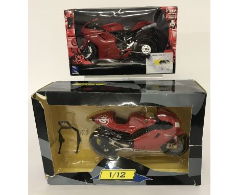 2 boxed 1:12 scale, motorcycle diecast models. A Ducati 1198  by Newray together with Max Biaggi's 2001 Yamaha YZR500 (box a/