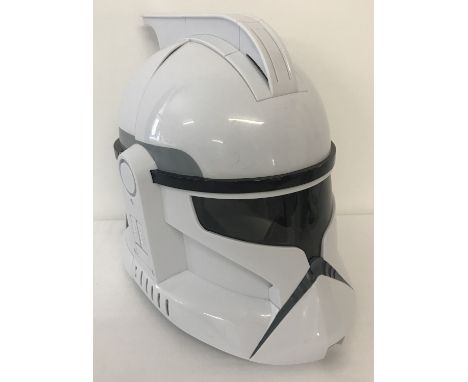 A battery operated talking Star Wars Storm Trooper helmet, with a variety of programmed phrases. In working order. 