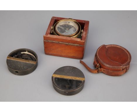 A Gimballed Compass and Clinometers,small gimballed boat copass in 19th century, lacquered brass in mahogany case, Singers Pa