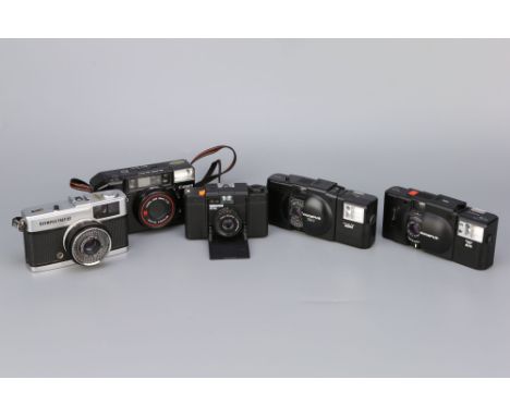 A Selection of Compact 35mm Film Cameras,including Olympus XA, Olympus XA1, Canon Sure Shot, Minox 35ML and Olympus Trip 35 (