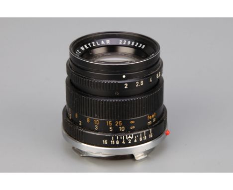 A Leitz Summicron f/2 50mm Lens,black, serial no. 2295239, some light internal haze and very light cleaning marks
