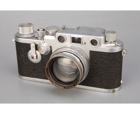 A Leica IIIf Delay Rangefinder Camera,chrome, serial no. 810396, with Leitz Summitar f/2 50mm lens, chrome, serial no. 555001