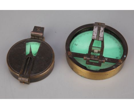 Magnetic Compasses, a large prismatic green card compass by Cary, case diameter 9.3cm, and an unsigned green card prismatic c