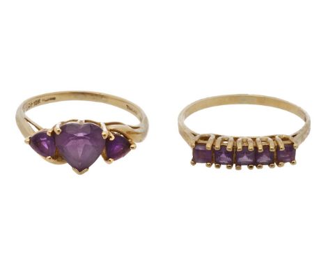 A 9ct amethyst heart ring and a five stone amethyst ringwith 9ct hallmarks, centre heart held in a claw setting with triangle