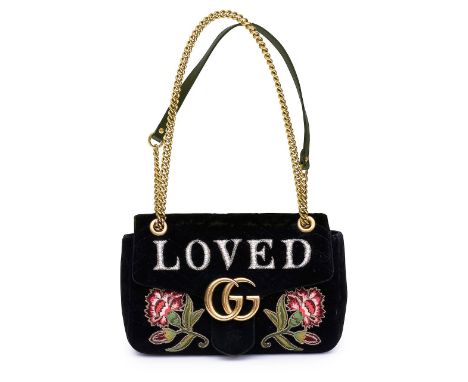A Gucci Marmont 'Loved' crossbody bagwith quilted black velvet and brass 'GG' monogram to flap, slotted lock closure with pus