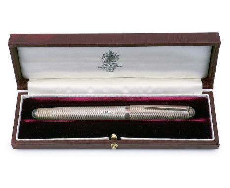 A cased Apsrey engine turned silver fountain pen London, 1988, Asprey &amp; Co, fitted with gold nib stamped Asprey 14ct, in 