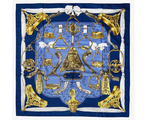 An Hermès 'Etriers' silk scarf designed by Françoise de la perrière in 1964 features bright colours contrasting with the dark