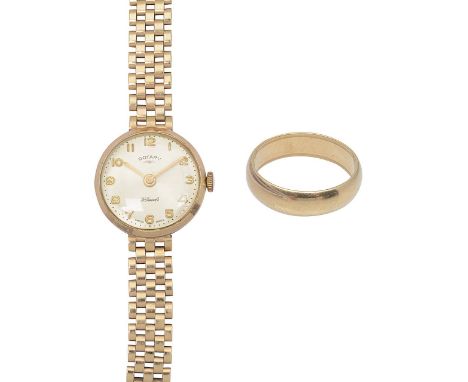 A 9ct gold Rotary lady's manual wind bracelet watch and 9ct wedding bandwith silvered dial and applied gilt Arabic numerals, 