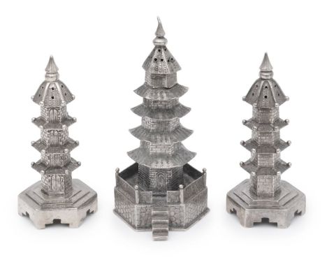 A pair of Chinese export .900 silver novelty pagoda pepperettes and another early 20th Centuryfirst marked WH 90, for Wang Hi
