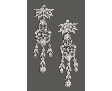 A pair of late 19th century diamond chandelier ear pendantseach with three, articulated, leaf design diamond set drops ending