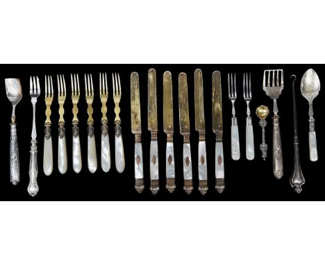 A matched set of six early 19th century French .800 silver gilt and mother of pearl handled dessert knives and other itemsfir