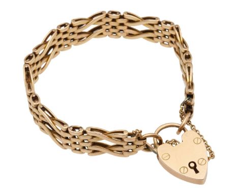 A 15ct fancy link gate braceletwith a heart catch stamped 15ct and a worn Chester hallmark to the ring with four bar long twi
