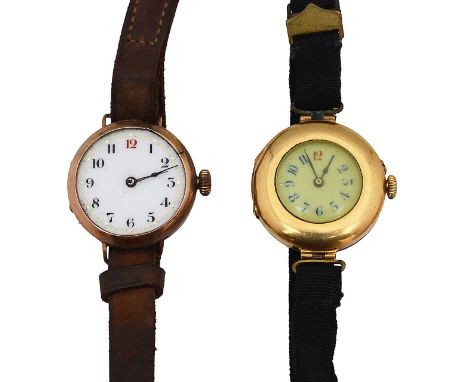 A lady's 18ct manual wind watch head, and aanother 9ct watch headthe first half hunter with aperture revealing enamel dial wi