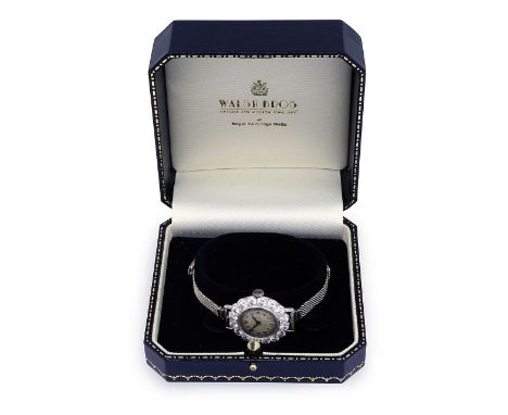 A 1930s Vertex Supreme diamond cocktail watchwith sixteen, scallop set diamond, round white dial with Arabic numerals, Milane