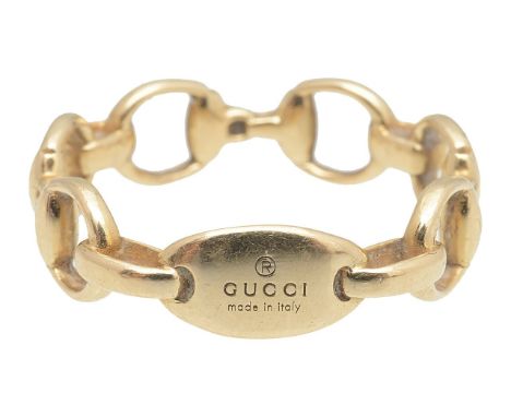 A 18ct Gucci snaffle bandwith Gucci made in Italy stamp to band. total approx. weight 4.2g total approx. finger size 'R'Condi
