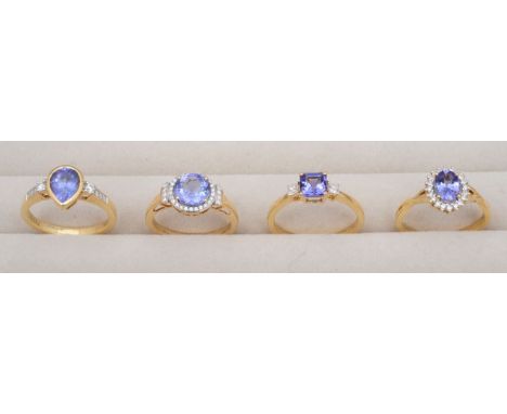 A collection of 18ct gold tanzanite and diamond ringsall with 18ct hallmarks, featuring a mixed cut oval tanzanite with micro
