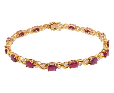 A 9ct gold ruby and diamond line braceletwith 9ct hallmark to catch, featuring fifteen oval rubies held in four claw setting 