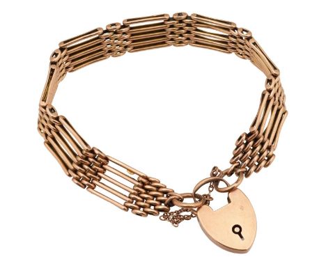 A 9ct gold five bar gate braceletwith 9ct hallmark to heart catch and jump rings, sets of five bars comprising of long and sh