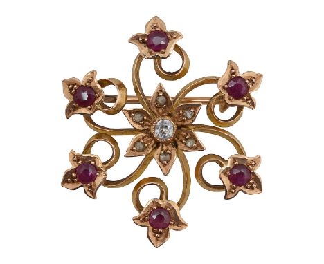 A 15ct Victorian ruby and diamond floral pendant broochwith a centre flower bezel set with an old cut diamond, six petals eac