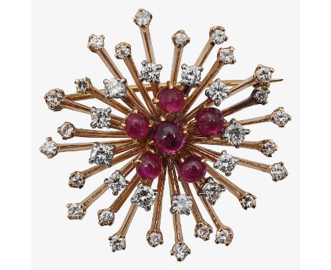 An elegant ruby and diamond floral broochwith ruby cabochons stones, centrally set with a spray of floating diamonds, 14ct st