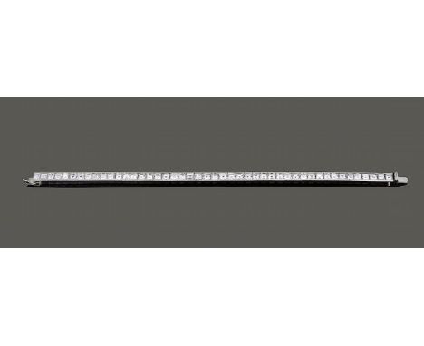 A fine diamond line bracelet by Birks of Canadathe forty-six square step-cut diamonds channel-set to the concealed clasp stam