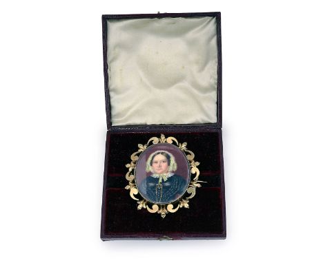 Mid 19th century British School. Portrait miniature of lady c.1840facing left, her hair parted and hanging in ringlets, weari