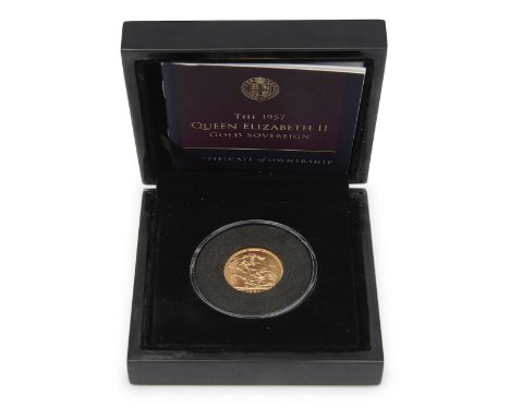 The Royal Mint. The 1957 Queen Elizabeth II Sovereign obverse; portrait of Queen Elizabeth II facing right, reverse; St Georg