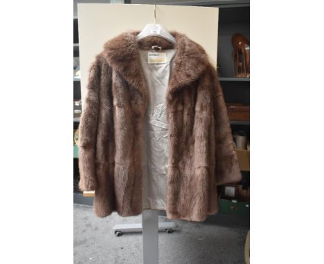 A vintage ladies brown fur jacket 44' approx.