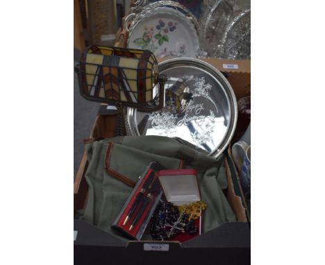 A Tiffany style candle holder styled as a desk lamp, a metal candlestick, a silver plated tray inscribed with Happy Anniversa