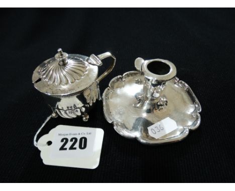 A Silver Mustard Pot Together With A Silver Chamber Stick