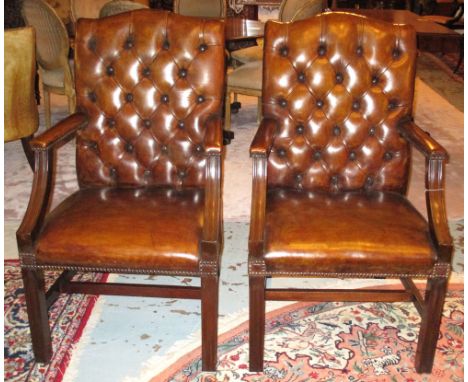 GAINSBOROUGH ARMCHAIRS, a pair, George III design button faded tan brown leather, 61cm W. (2)