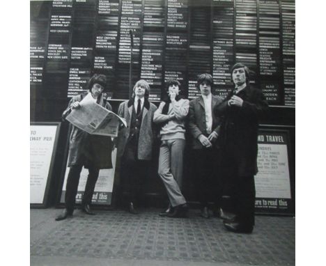 ROLLING STONES AT VICTORIA  STATION PLATFORM 14, taking public transport to Brighton, 11/10/1964,  handprinted photo from neg